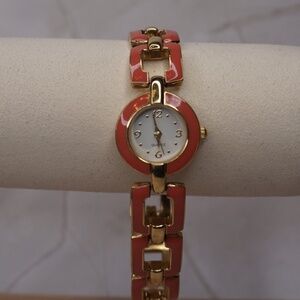 Gold and Deep Peach Tone, 1990's Avon Round Dainty Watch